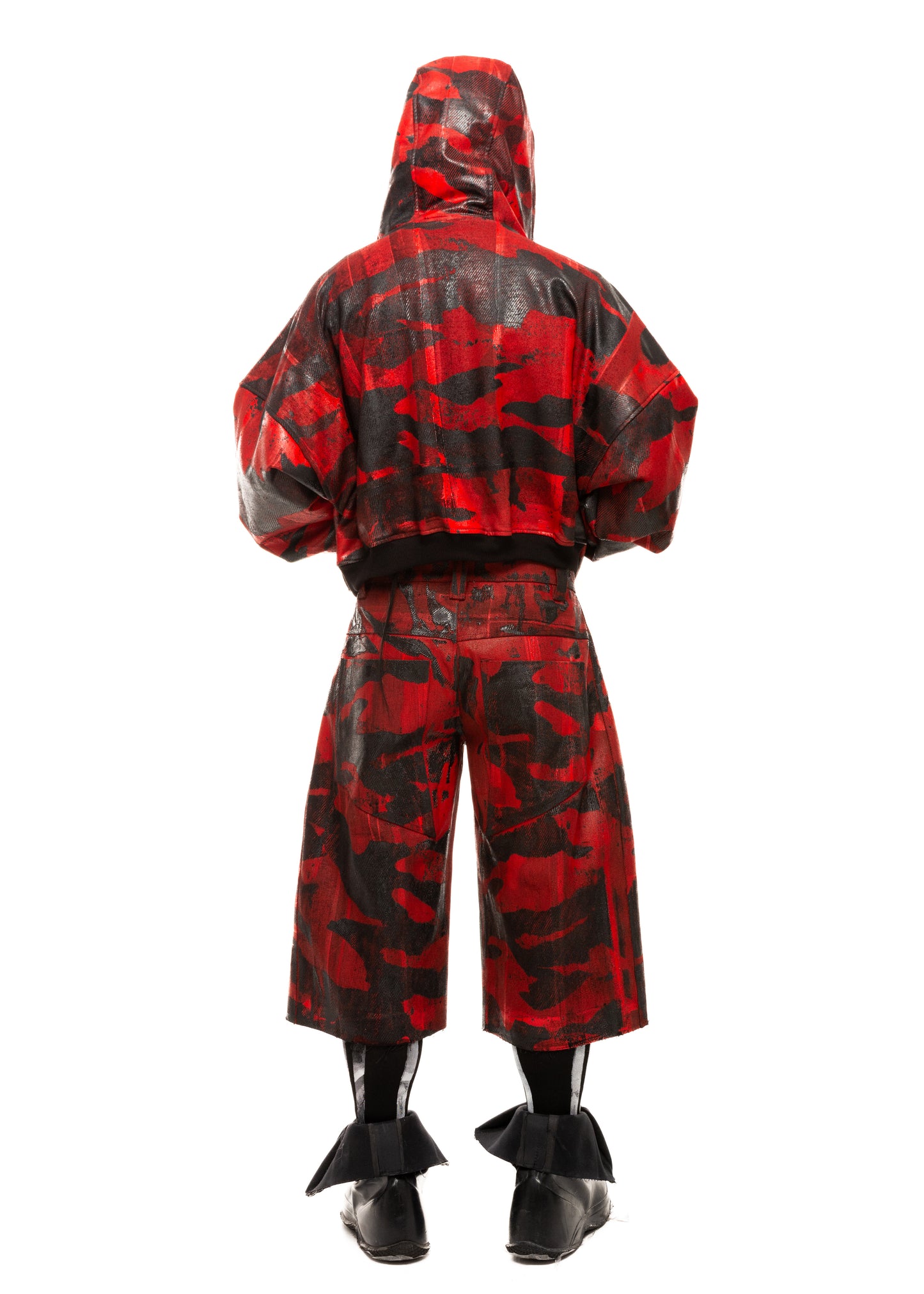 Back view of red camo shorts with waxed finish and cropped length
