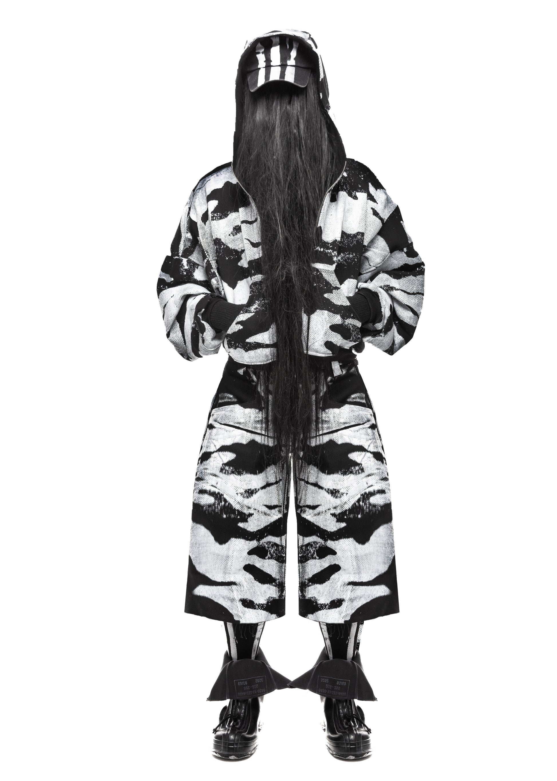 Front view of camo black denim shorts in wide-leg streetwear fit – PLA4
