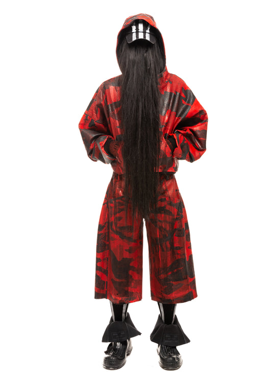 Front view of CAMO WAXED RED DENIM SHORTS worn with matching hoodie and boots